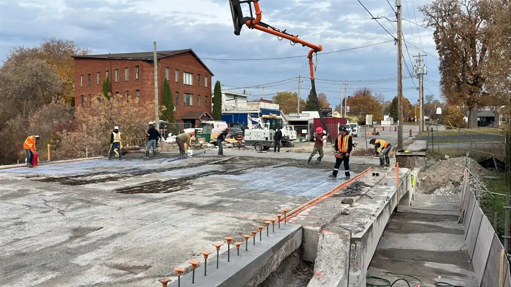 TSI crew pouring a concrete bridge deck